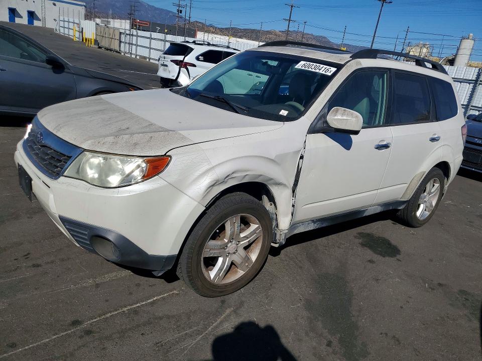 SUBARU FORESTER 2010 with VIN JF2SH6CC4AG717540 - Photo from auction