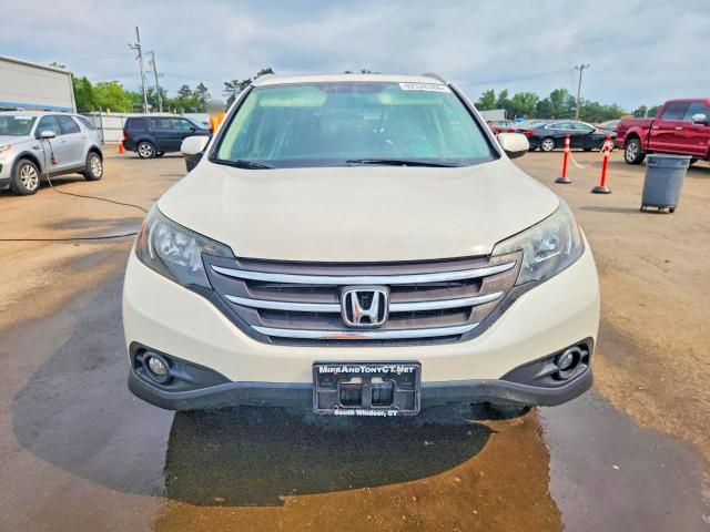 Photo 5 from auction – 2014 HONDA CR-V with VIN 5J6RM4H79EL068222