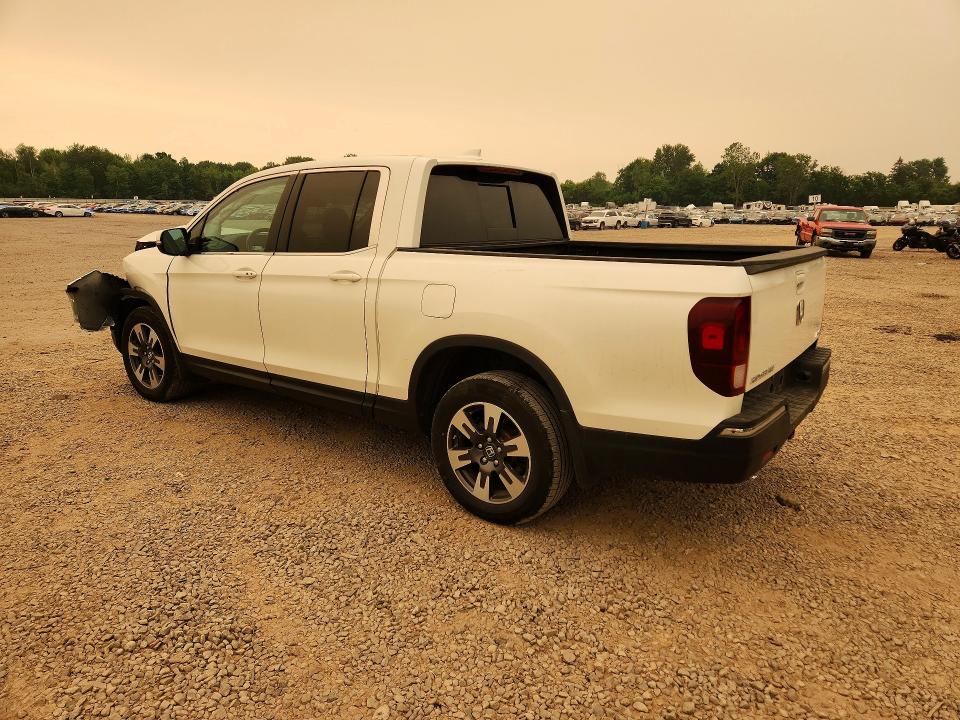 Photo 2 from auction – 2019 HONDA RIDGELINE with VIN 5FPYK3F52KB013930