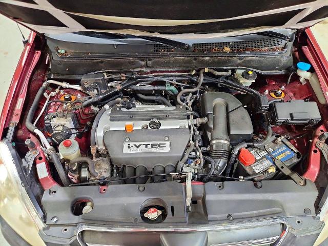 Photo 12 from auction – 2006 HONDA CR-V with VIN JHLRD78826C052884