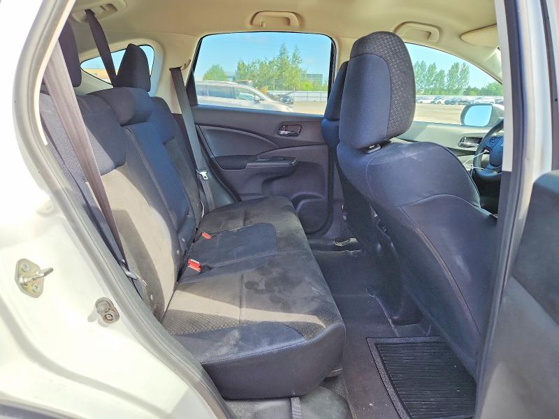 Photo 11 from auction – 2016 HONDA CR-V with VIN 2HKRM4H49GH107426