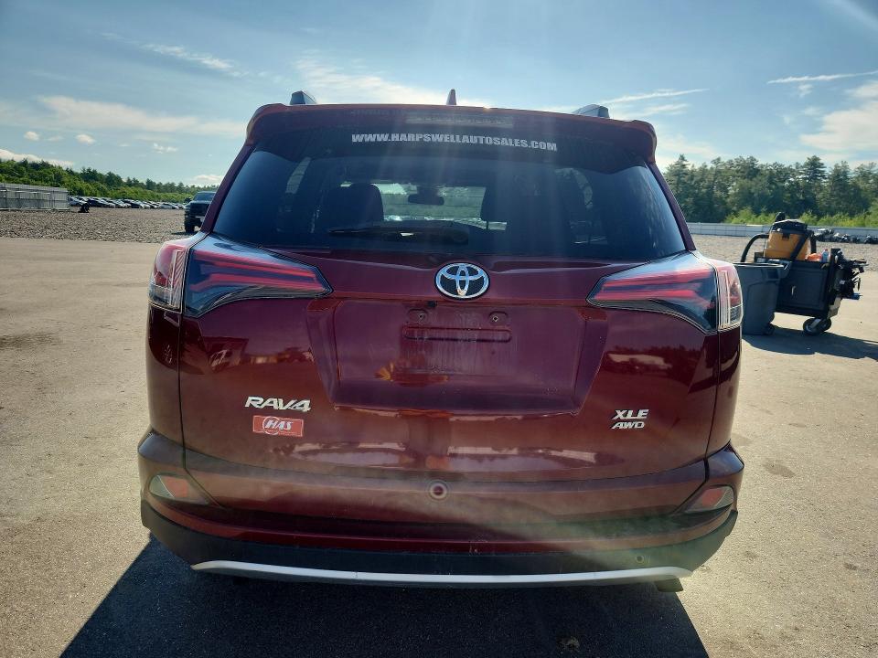Photo 6 from auction – 2018 TOYOTA RAV4 with VIN 2T3RFREVXJW816533