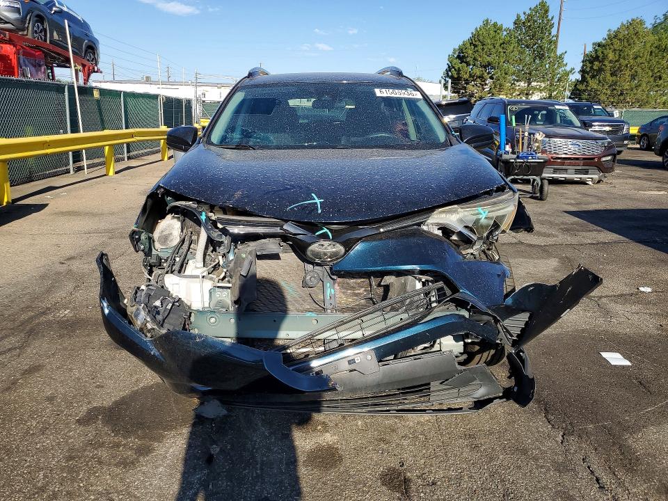 Photo 5 from auction – 2018 TOYOTA RAV4 with VIN JTMZFREV8JJ738462