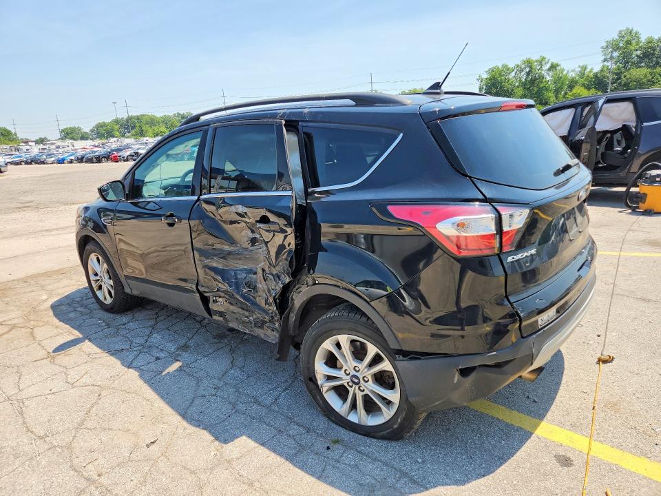 Photo 2 from auction – 2018 FORD ESCAPE with VIN 1FMCU9GD6JUD39138