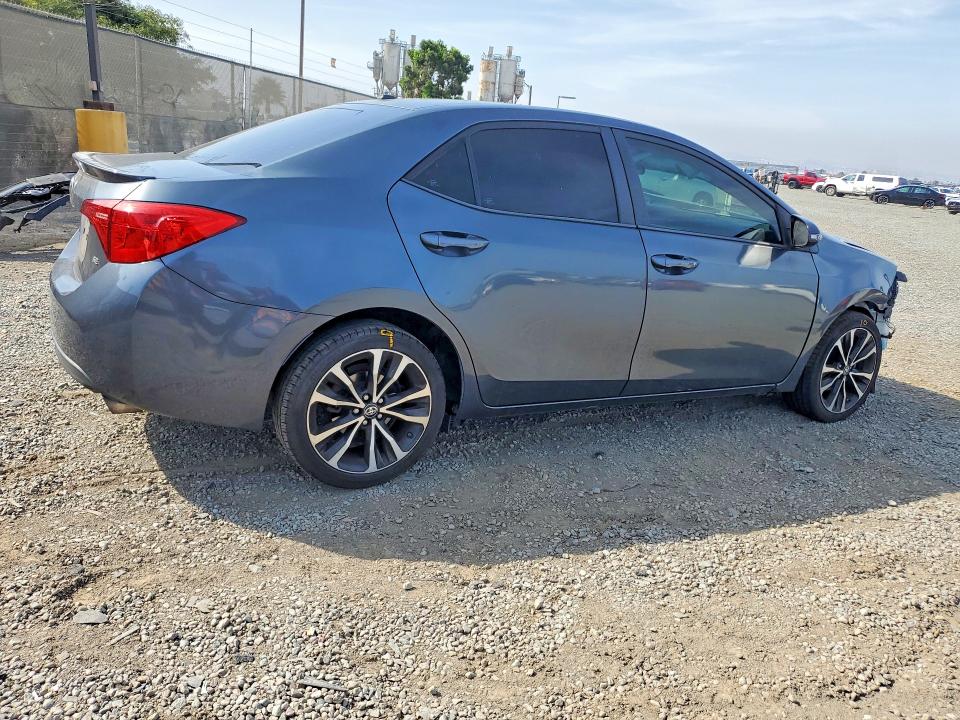 Photo 3 from auction – 2018 TOYOTA COROLLA with VIN 5YFBURHE2JP785176