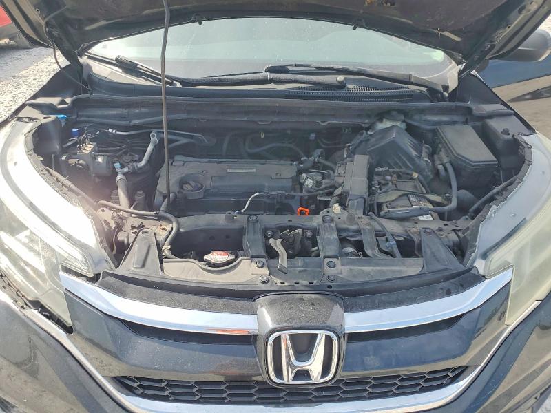 Photo 12 from auction – 2016 HONDA CR-V with VIN 2HKRM4H38GH694161