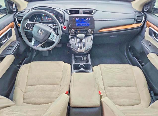 Photo 8 from auction – 2017 HONDA CR-V with VIN 2HKRW1H54HH519269