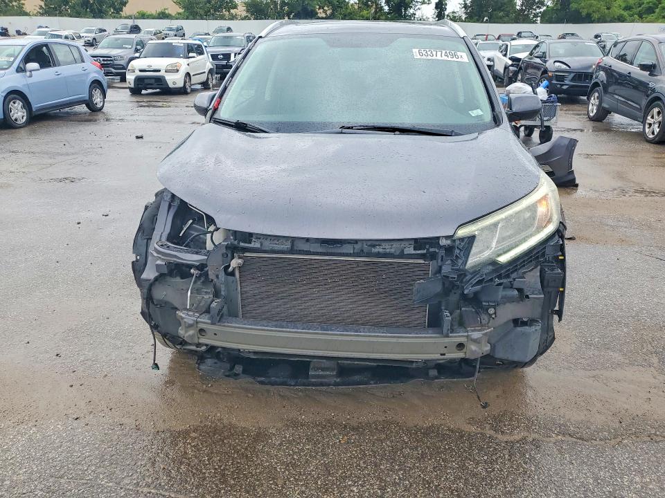 Photo 5 from auction – 2015 HONDA CR-V with VIN 5J6RM4H77FL002382