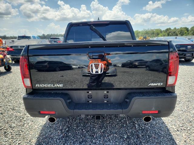 Photo 6 from auction – 2023 HONDA RIDGELINE with VIN 5FPYK3F58PB046096