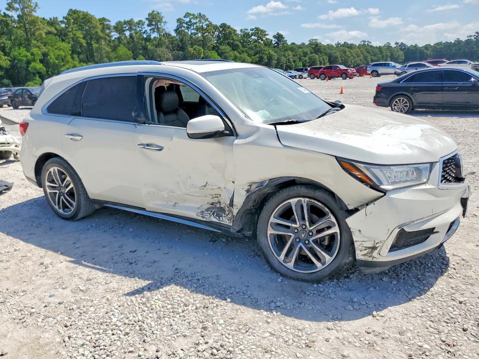 Photo 4 from auction – 2017 ACURA MDX with VIN 5FRYD3H91HB013394