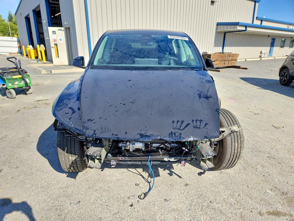 Photo 5 from auction – 2026 TESLA MODEL Y with VIN 7SAYGDEE1TA649046
