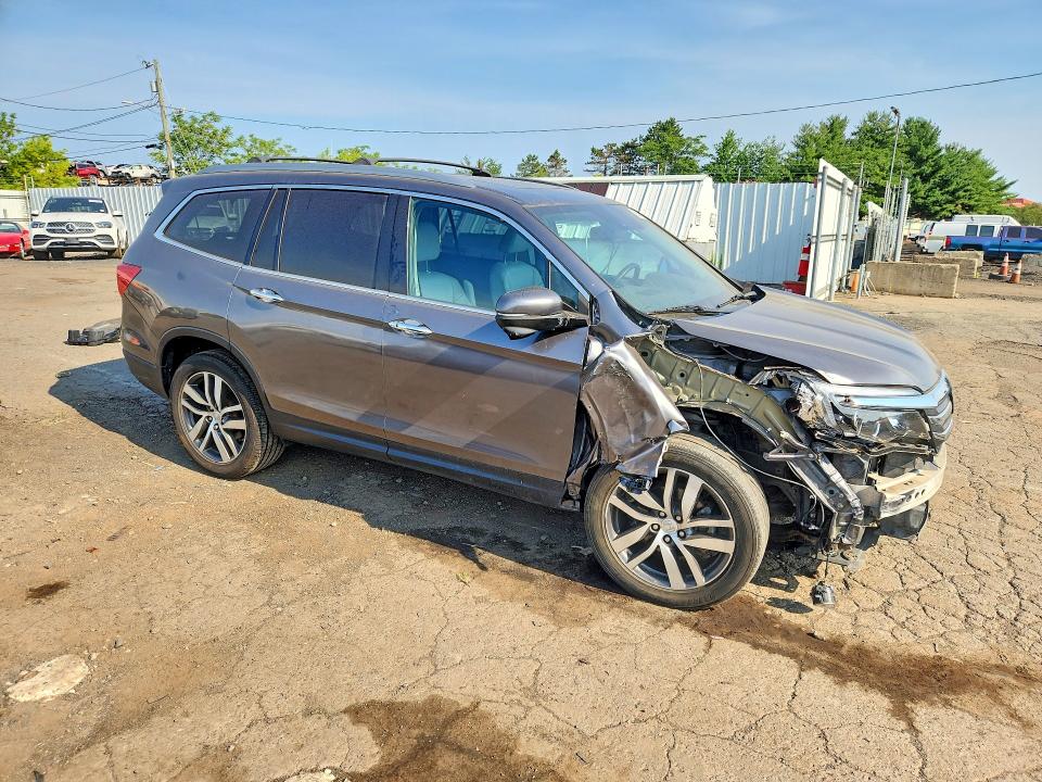 Photo 4 from auction – 2016 HONDA PILOT with VIN 5FNYF6H90GB070164
