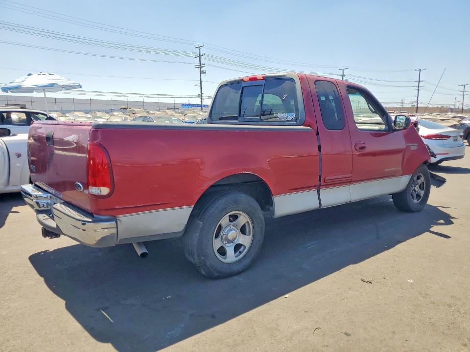 Photo 3 from auction – 2000 FORD F150 with VIN 1FTRX17W6YNB58053