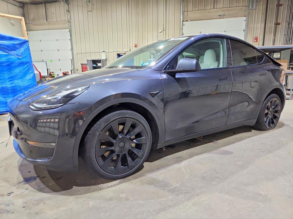 TESLA MODEL Y 2024 with VIN 7SAYGAEE9RF022833 - Photo from auction