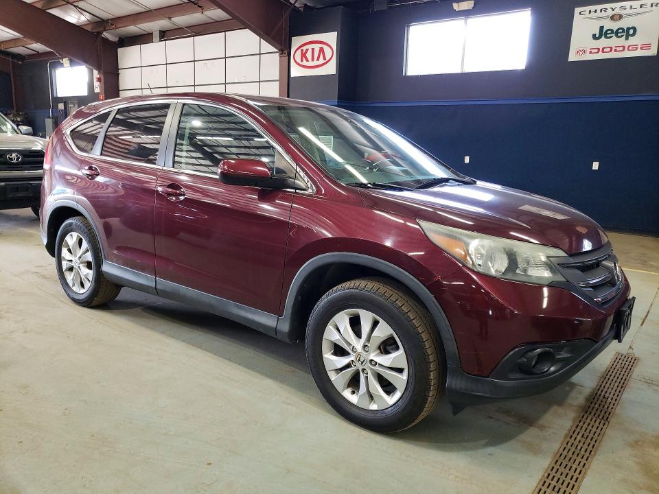 Photo 4 from auction – 2014 HONDA CR-V with VIN 5J6RM4H50EL025855