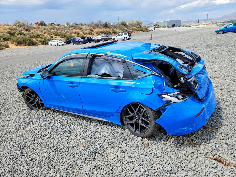 Photo 2 from auction – 2022 HONDA CIVIC with VIN 19XFL1H85NE021555