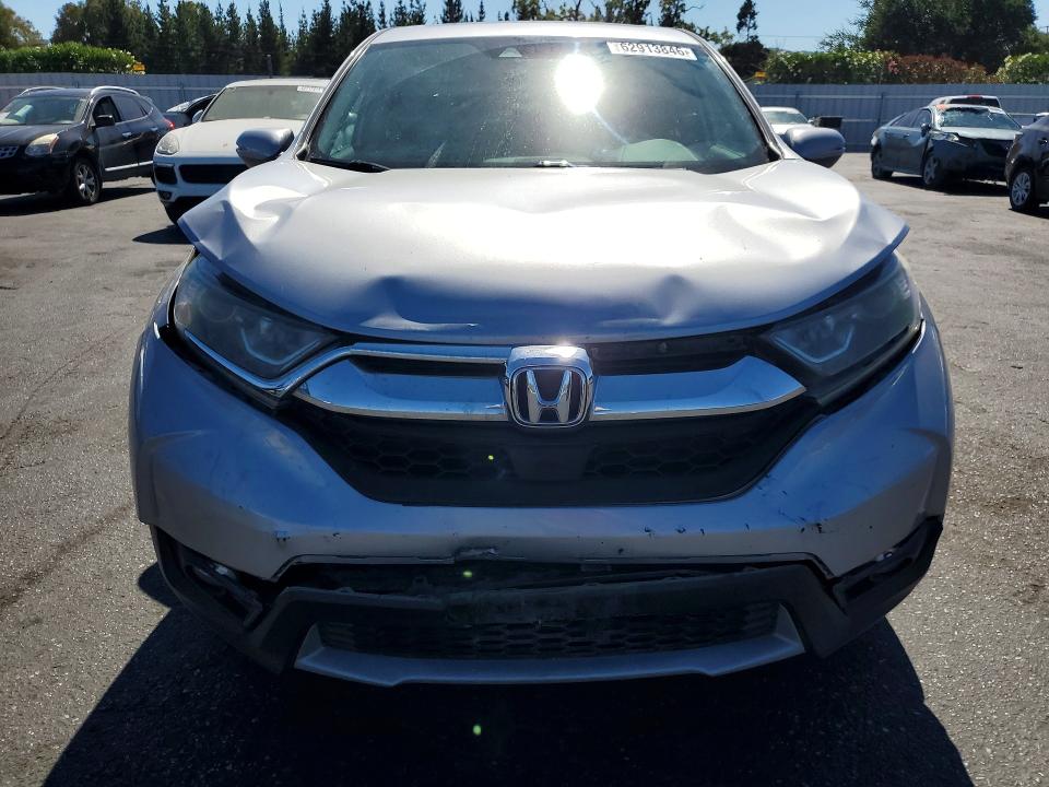 Photo 5 from auction – 2017 HONDA CR-V with VIN 7FARW1H88HE043153
