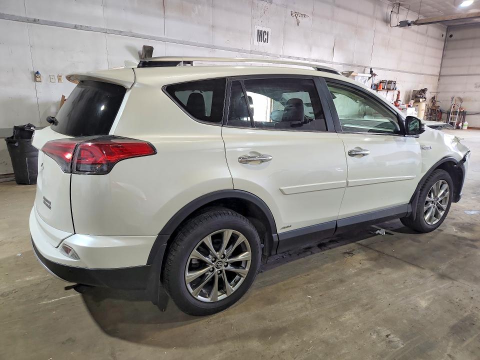 Photo 3 from auction – 2016 TOYOTA RAV4 HV with VIN JTMDJREV0GD032103