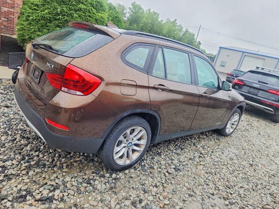 Photo 3 from auction – 2015 BMW X1 with VIN WBAVL1C5XFVY34621