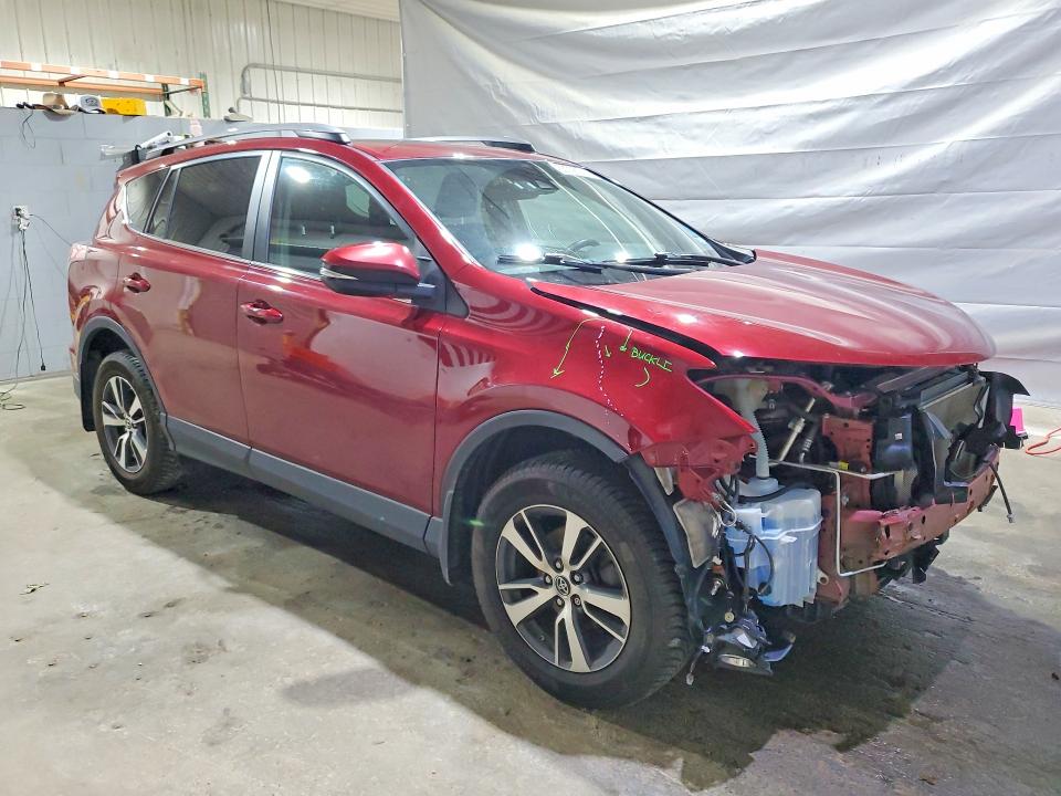 Photo 4 from auction – 2018 TOYOTA RAV4 with VIN 2T3RFREV8JW728967