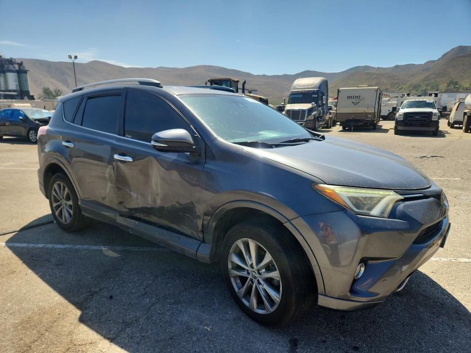 Photo 4 from auction – 2017 TOYOTA RAV4 with VIN 2T3YFREV7HW329084