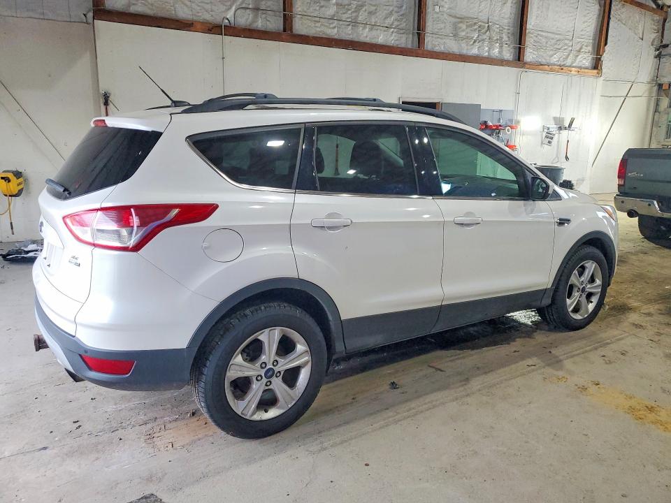 Photo 3 from auction – 2016 FORD ESCAPE with VIN 1FMCU9G9XGUA74373