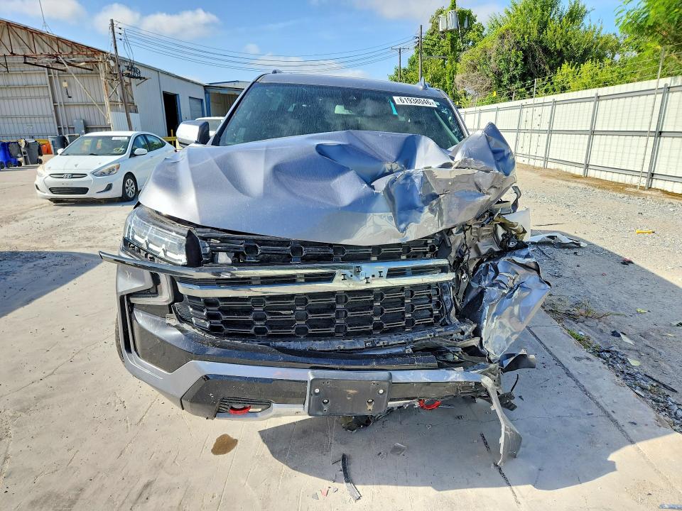 Photo 5 from auction – 2021 CHEVROLET SUBURBAN with VIN 1GNSKDKD3MR453161
