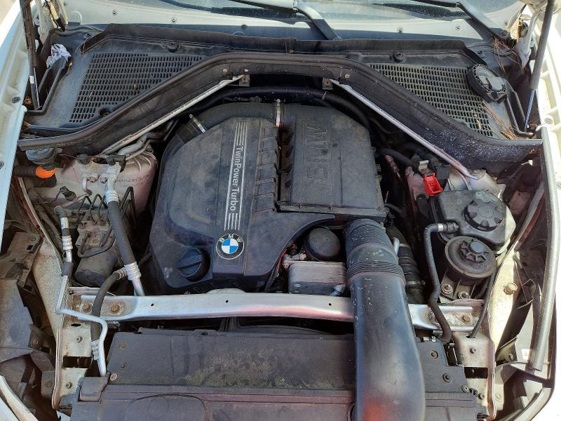 Photo 12 from auction – 2011 BMW X5 with VIN 5UXZV4C56BL738232