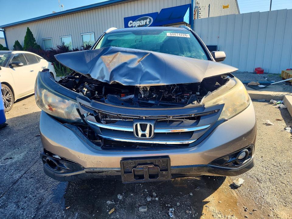 Photo 5 from auction – 2012 HONDA CR-V with VIN 5J6RM3H70CL042177