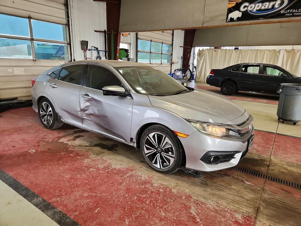 Zdjęcie 4 z aukcji – 2016 HONDA CIVIC z VIN 2HGFC1F74GH635922