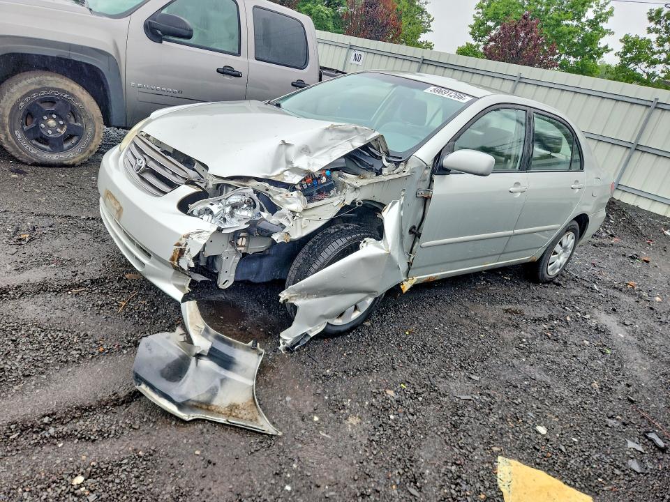 TOYOTA COROLLA 2004 with VIN JTDBR32EX42040329 - Photo from auction