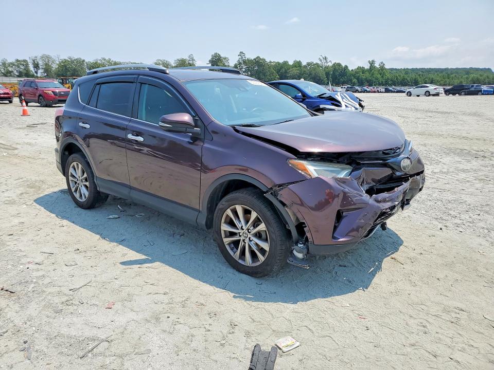 Photo 4 from auction – 2018 TOYOTA RAV4 with VIN 2T3YFREV3JW415465