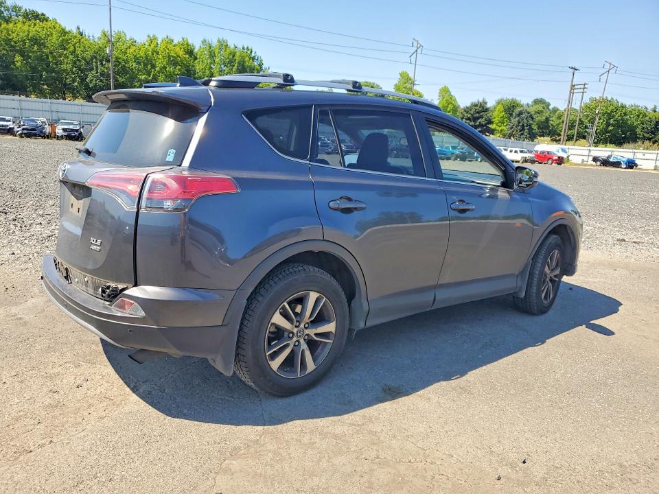 Photo 3 from auction – 2017 TOYOTA RAV4 with VIN JTMRFREVXHJ713444