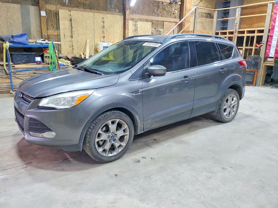 FORD ESCAPE 2014 with VIN 1FMCU9GX1EUA05485 - Photo from auction