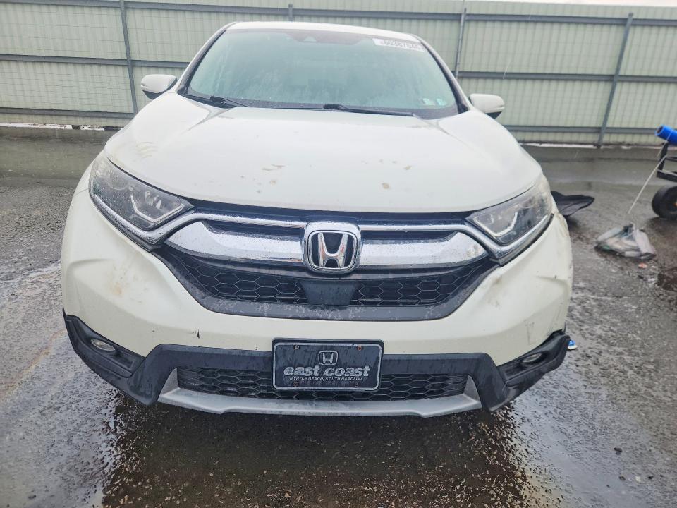 Photo 5 from auction – 2017 HONDA CR-V with VIN 2HKRW1H55HH500665