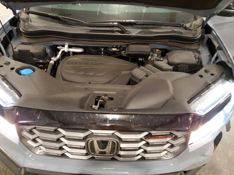Photo 12 from auction – 2024 HONDA PASSPORT with VIN 5FNYF8H61RB019924