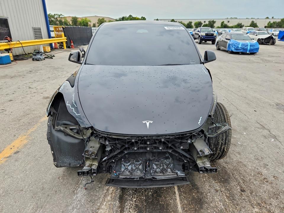 Photo 5 from auction – 2022 TESLA MODEL Y with VIN 7SAYGDEE3NA015482