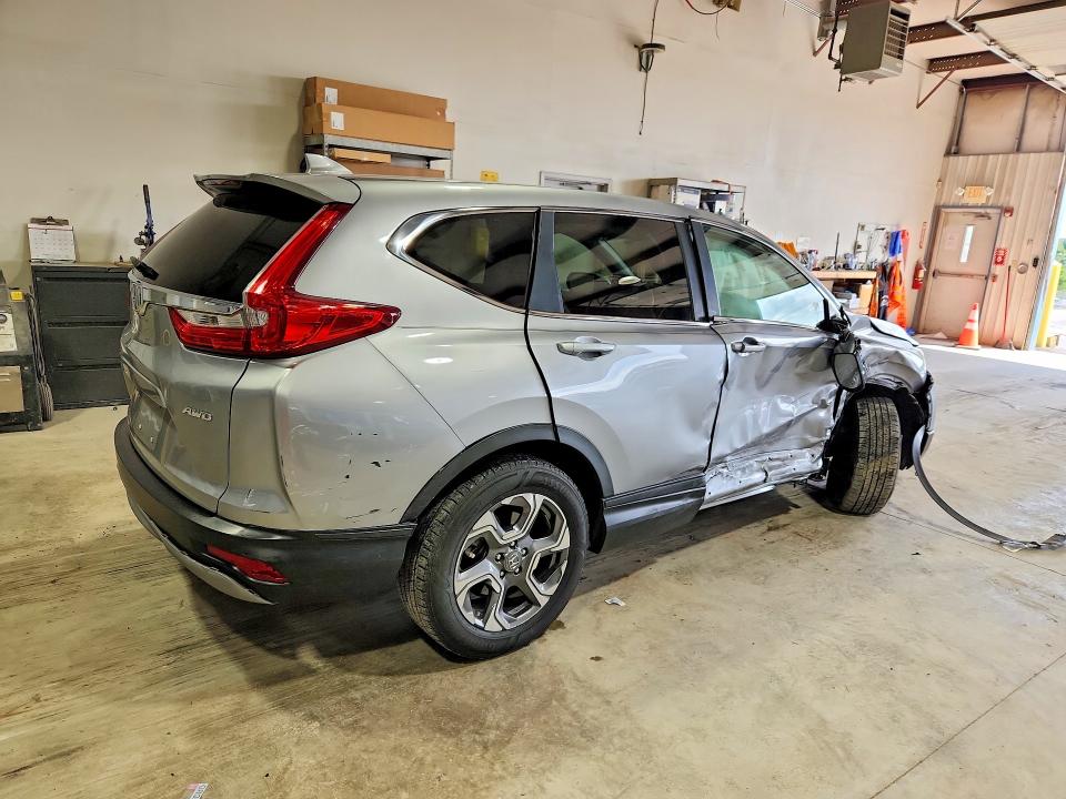 Photo 3 from auction – 2019 HONDA CR-V with VIN 5J6RW2H53KL010762
