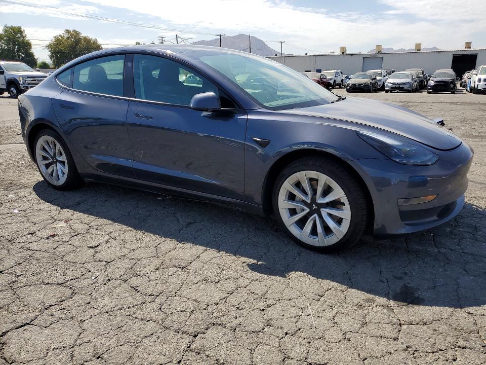 Photo 4 from auction – 2023 TESLA MODEL 3 with VIN 5YJ3E1EA2PF570597