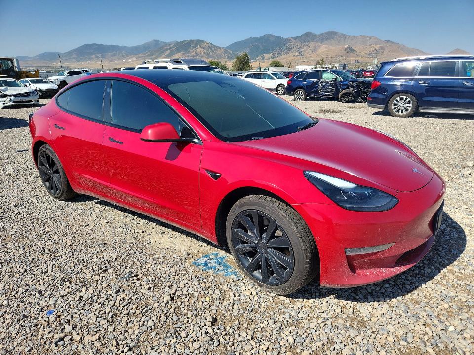 Photo 4 from auction – 2022 TESLA MODEL 3 with VIN 5YJ3E1EB7NF190354