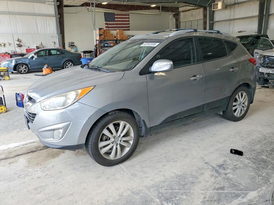 HYUNDAI TUCSON 2013 with VIN KM8JUCAC6DU621840 - Photo from auction