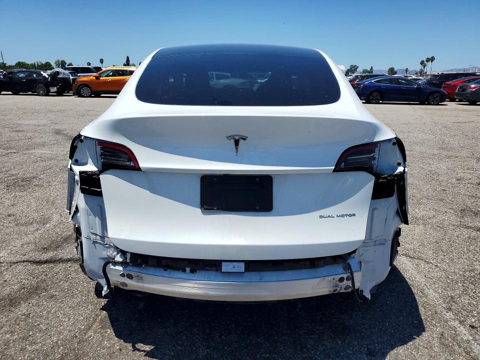 Photo 6 from auction – 2022 TESLA MODEL Y with VIN 7SAYGAEE9NF465526