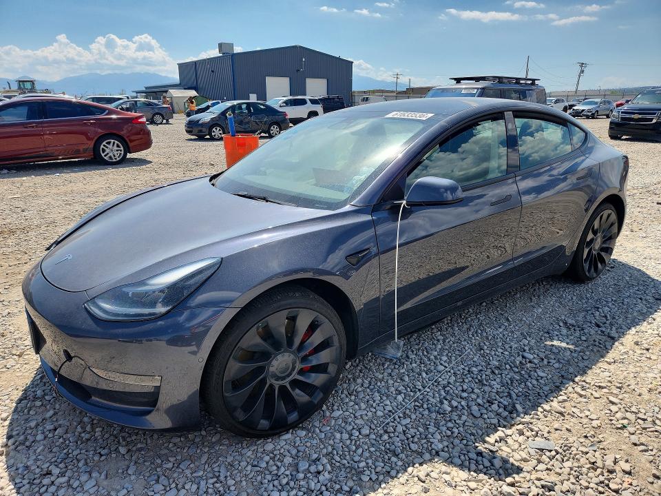 TESLA MODEL 3 2022 with VIN 5YJ3E1ECXNF231939 - Photo from auction