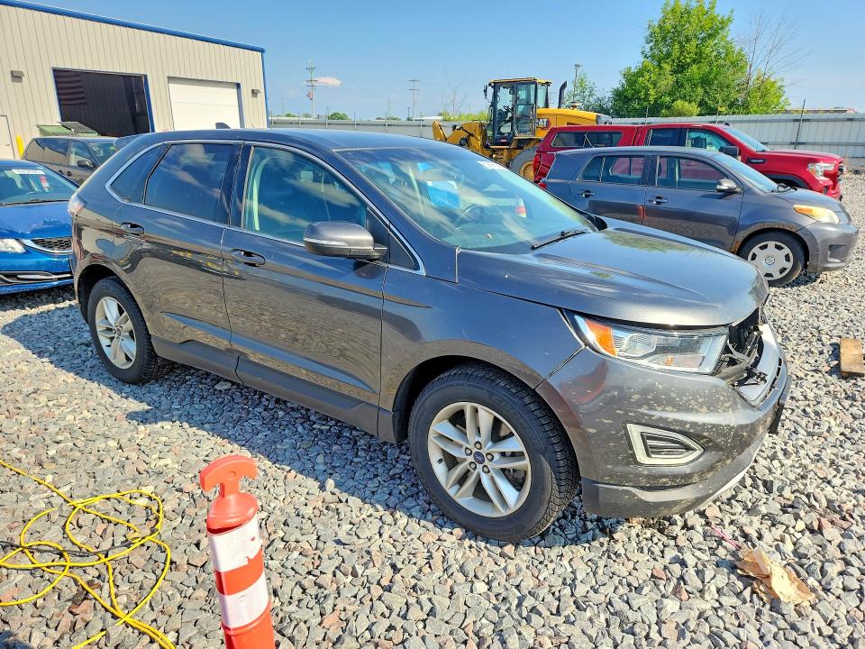 Photo 4 from auction – 2016 FORD EDGE with VIN 2FMPK4J99GBB70259