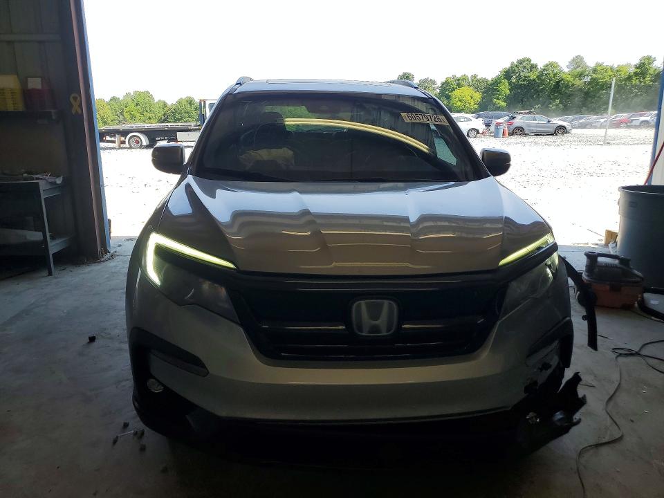 Photo 5 from auction – 2021 HONDA PILOT with VIN 5FNYF5H24MB031599