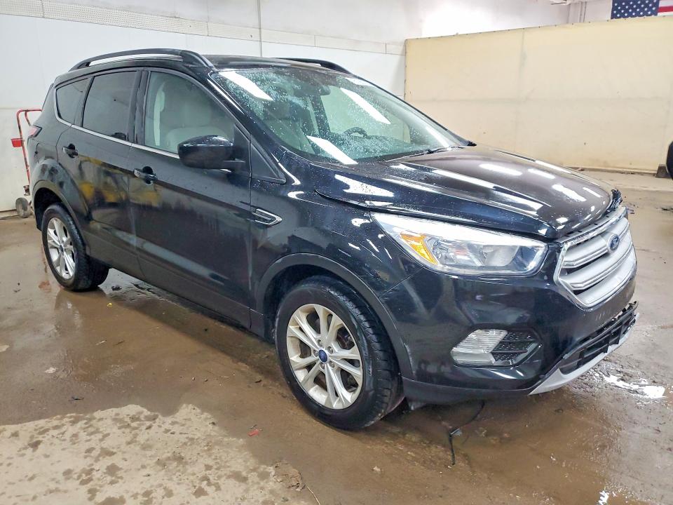 Photo 4 from auction – 2018 FORD ESCAPE with VIN 1FMCU9GD5JUB52134