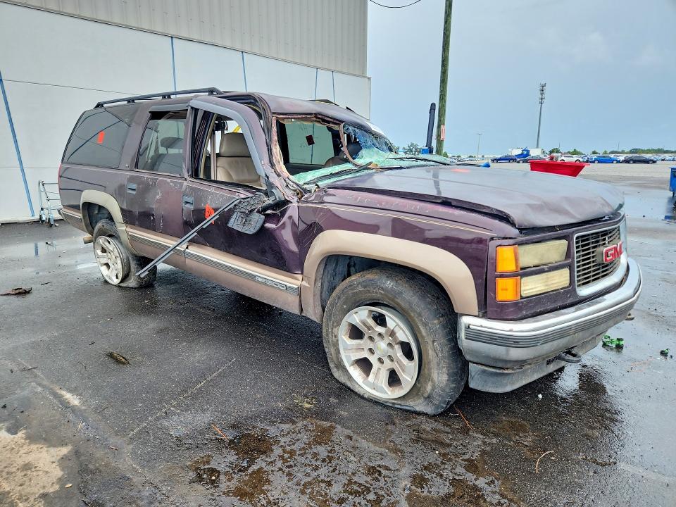 Photo 4 from auction – 1997 GMC SUBURBAN with VIN 1GKFK16R6VJ751674