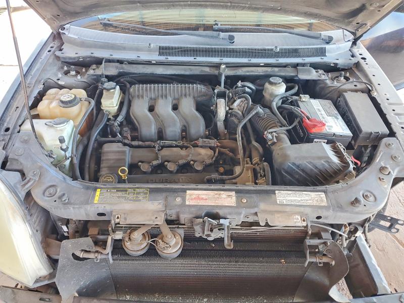 Photo 11 from auction – 2006 MERCURY MONTEGO with VIN 1MEHM42166G619043