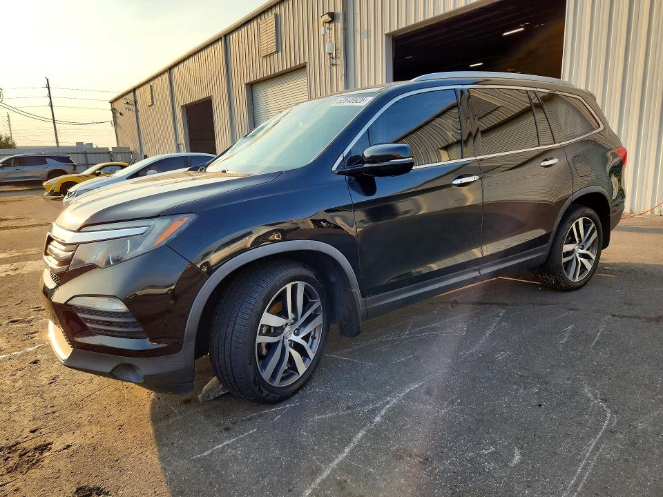 HONDA PILOT 2017 with VIN 5FNYF6H93HB024328 - Photo from auction