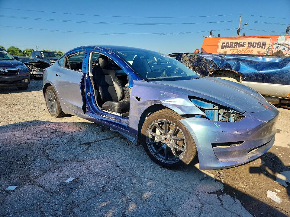 Photo 4 from auction – 2022 TESLA MODEL 3 with VIN 5YJ3E1EBXNF103997
